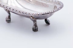 Smooth silver candy box embossed on the edge