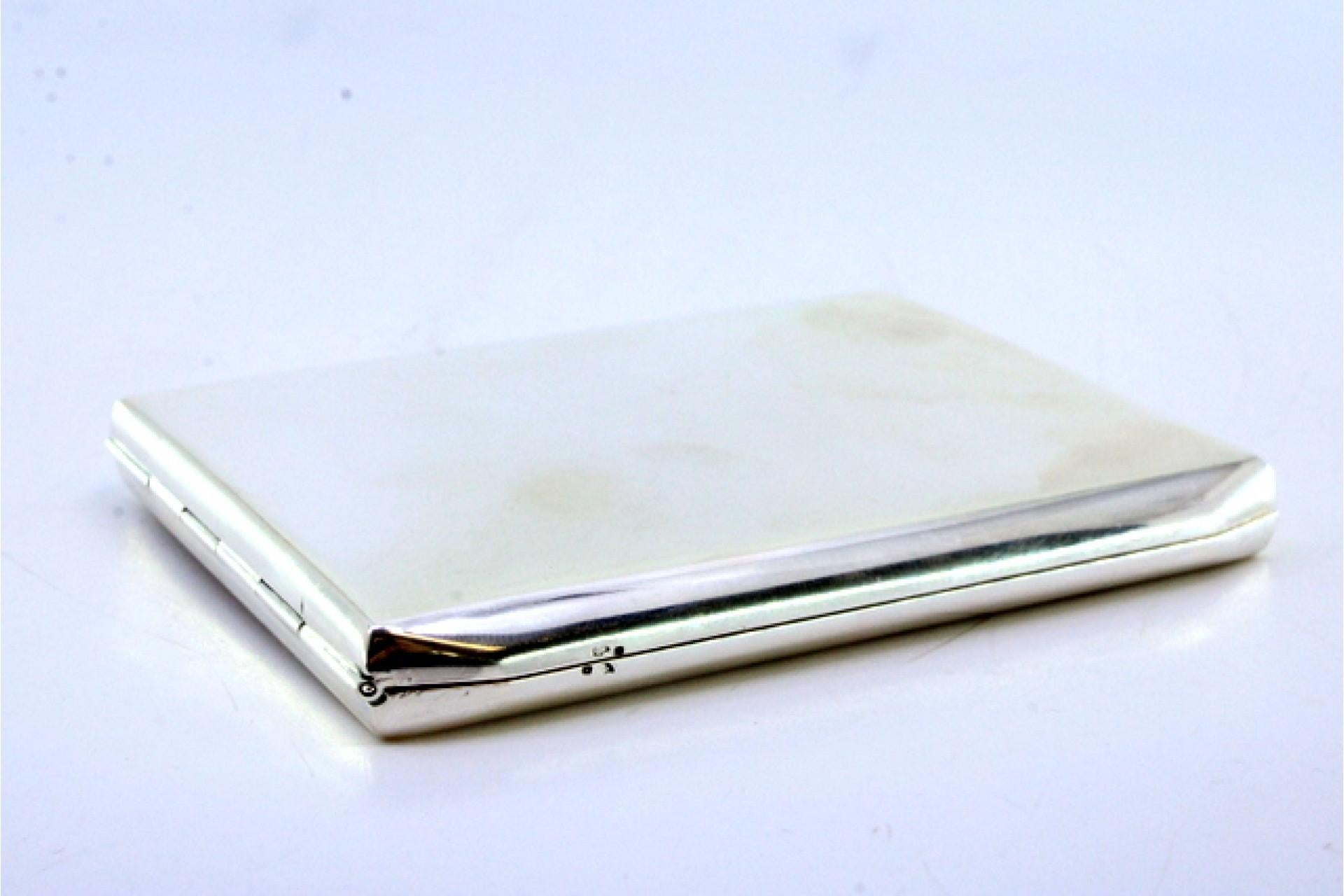 European Smooth silver case with beveled corners, interior ribbons, hinged lid For Sale