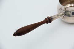 Smooth silver chocolate maker with wooden handle