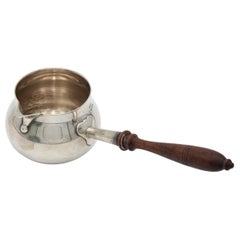 Smooth silver chocolate maker with wooden handle