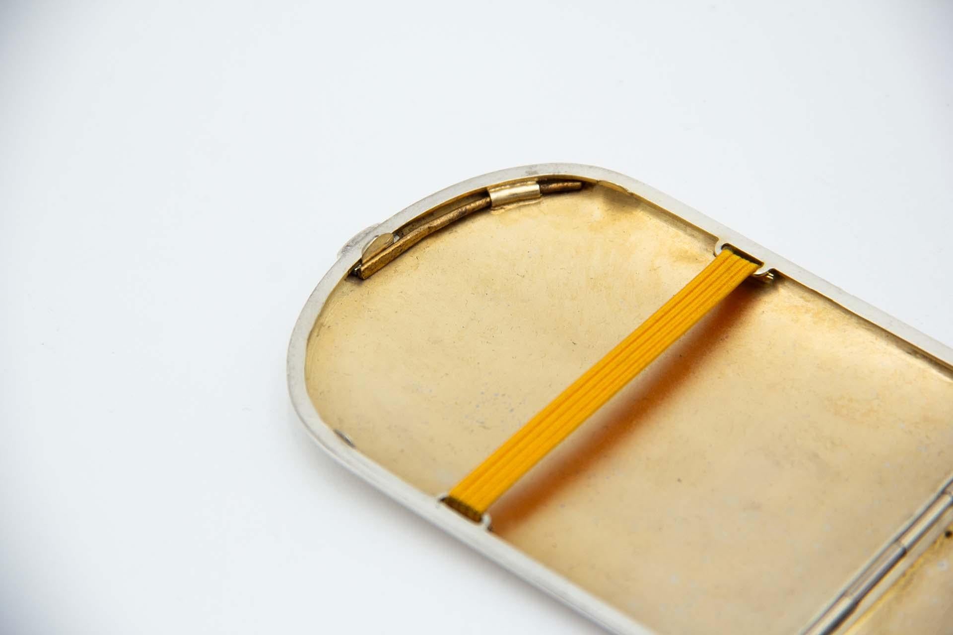 European Smooth silver cigarette case with a semi-oval shape For Sale