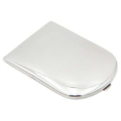 Smooth silver cigarette case with a semi-oval shape