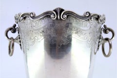 Smooth silver ice bucket w/ plant engravings & ring handles