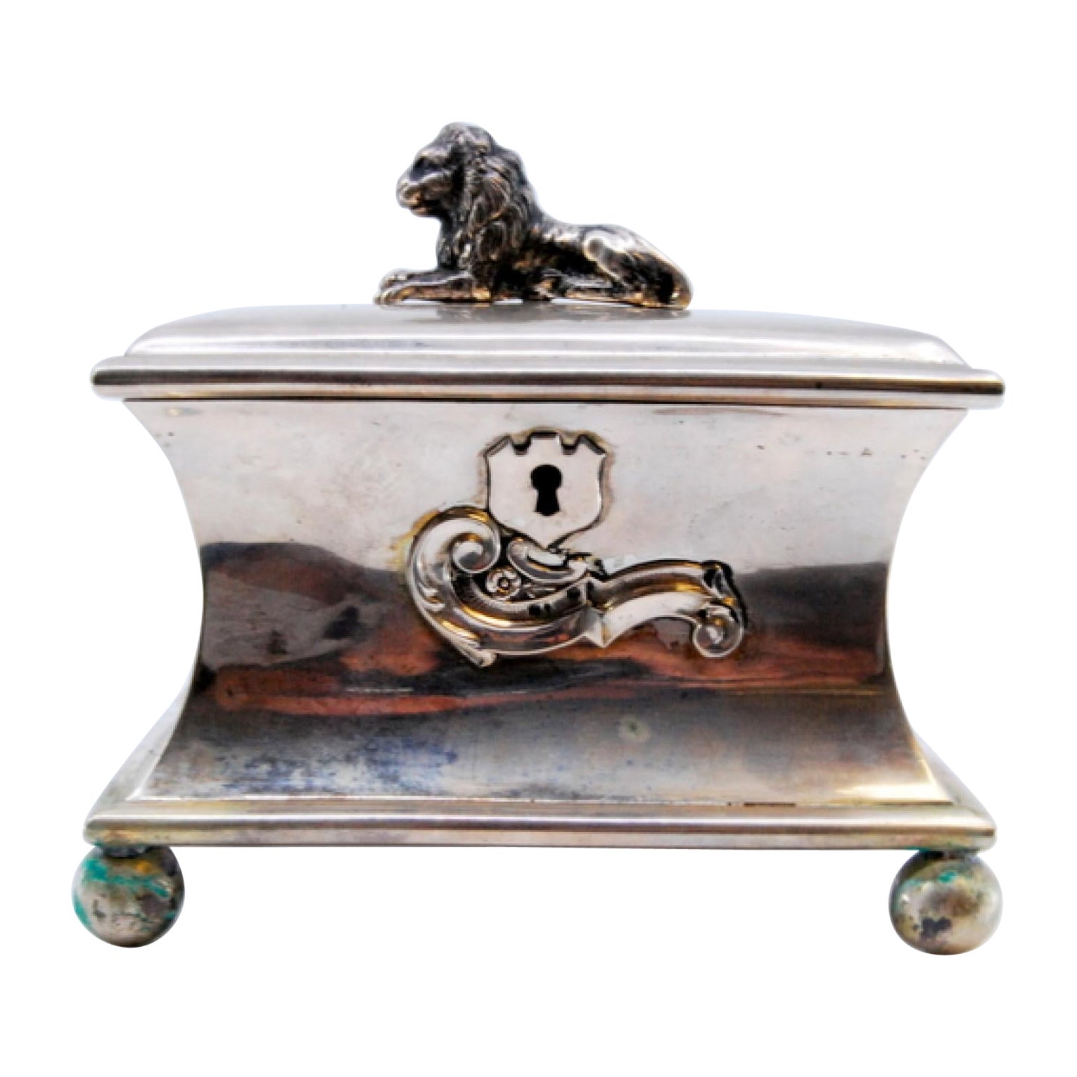 Smooth silver jewelry box with chest trim and lion figure on hinged lid