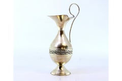 Smooth silver jug