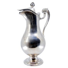 Smooth silver jug