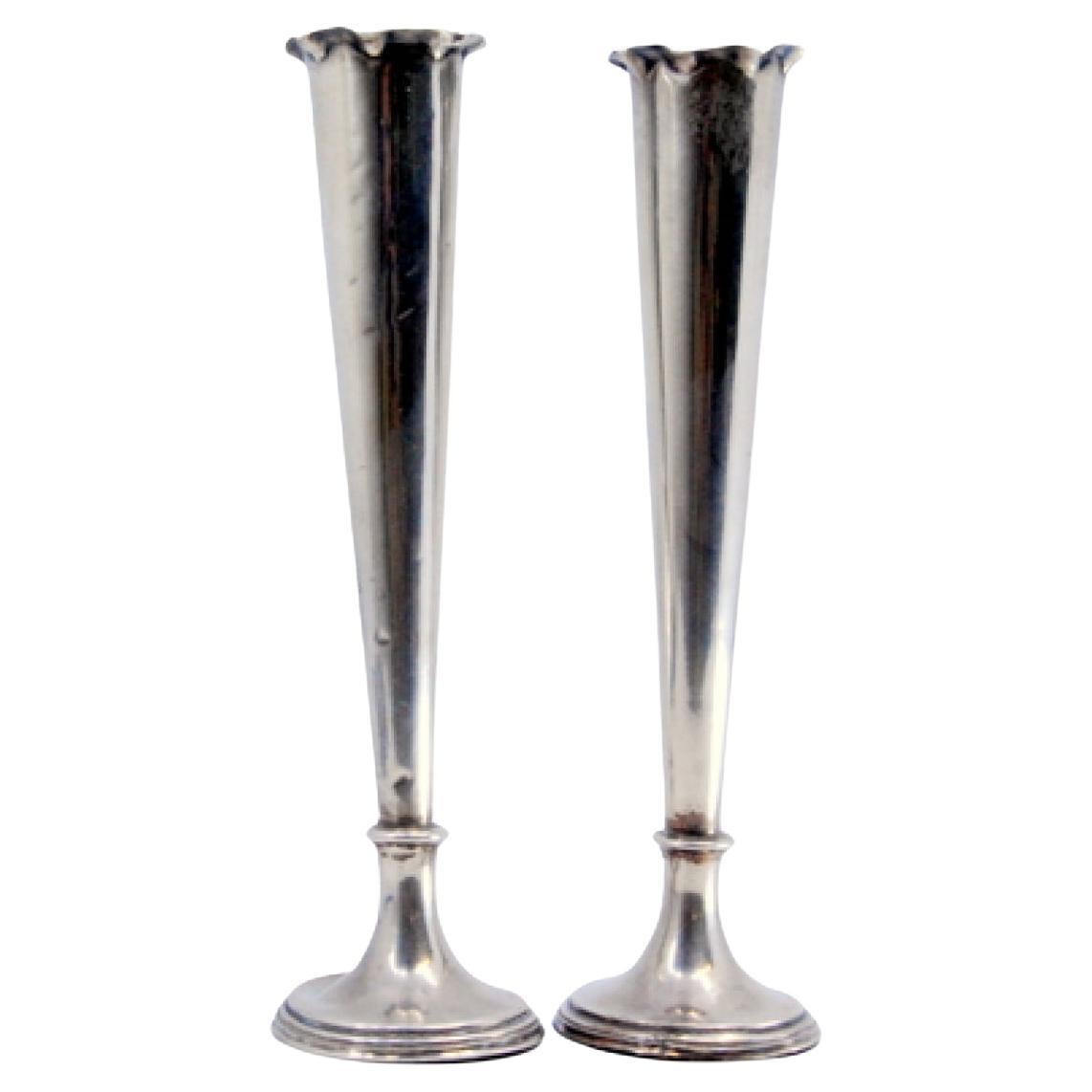 Smooth silver jugs with wavy edges and fillings at the bases For Sale