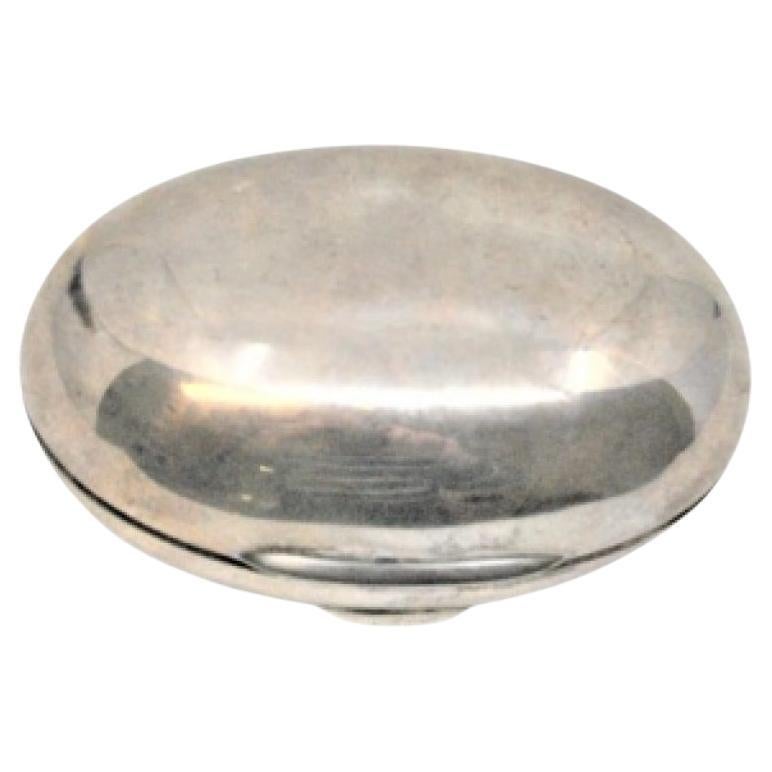 Smooth silver oval-shaped soap dish with a hinged lid