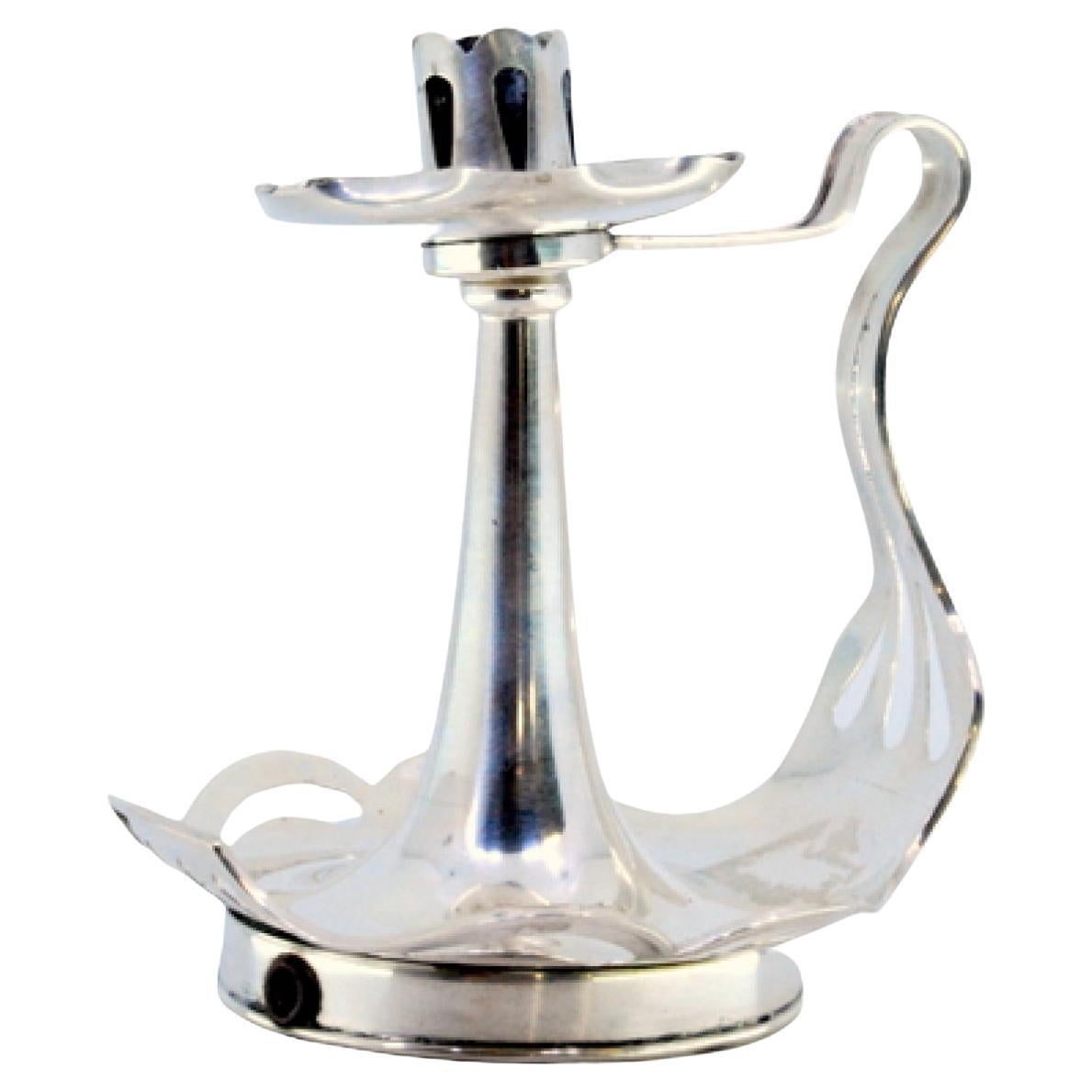 Smooth silver paddle cut in the Art Nouveau style