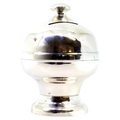 Smooth silver piggy bank with removable base and knob on top