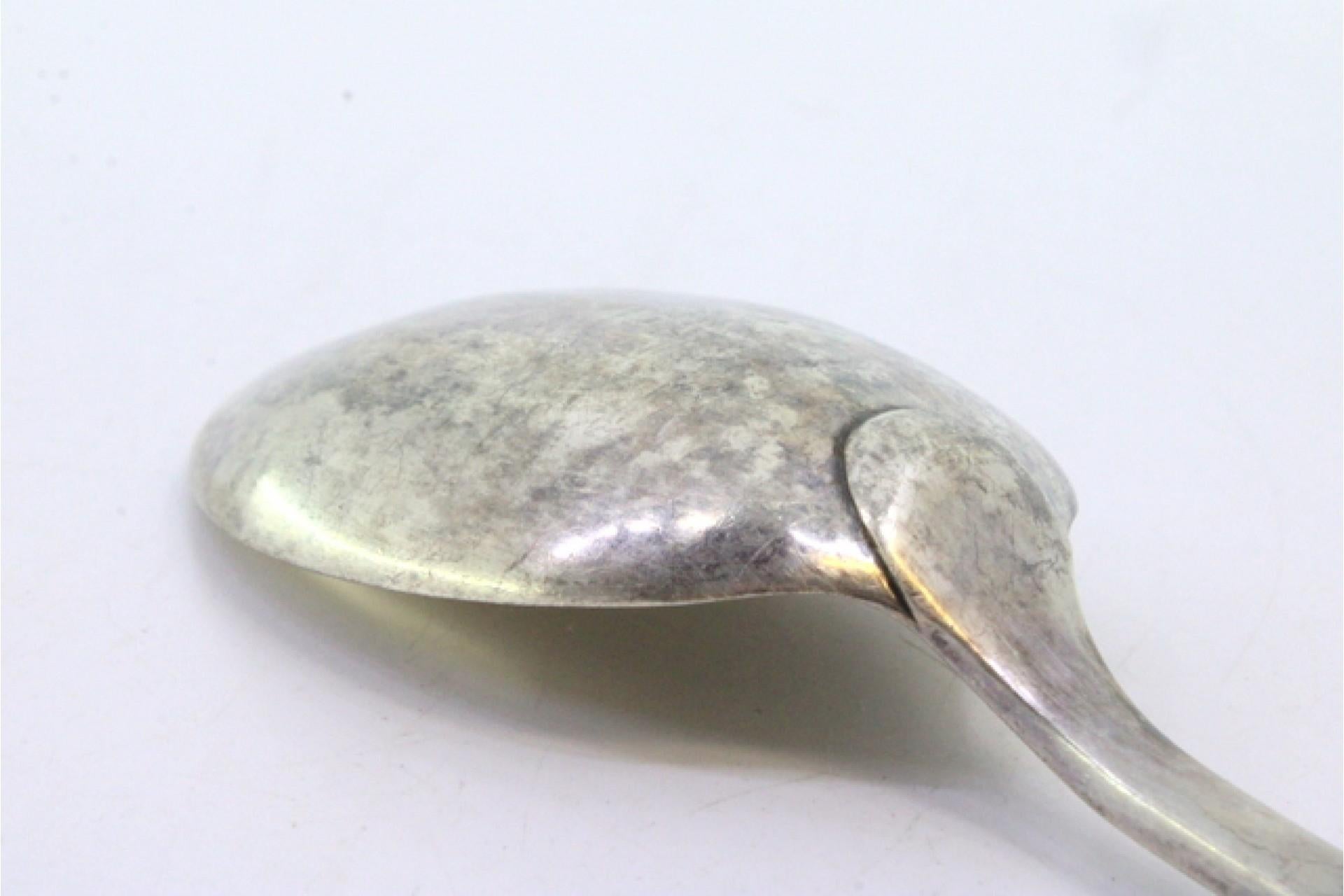 Smooth silver rice/serving spoon with caninhas-style relief handle Europeo en venta