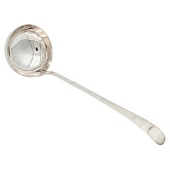 Smooth silver shell with friezes