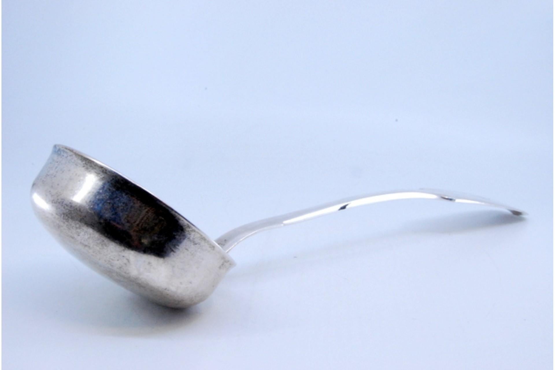 Description: Smooth silver soup ladle in Russian style with extended handle. Metal: Silver. Origin: Russia. Brand: Moscow. Weight: 212.27 grams. Dimensions: 30.5x8.2cm. Content: 84 zlotys (875/1000). Assay Mark: Yes, between 1898 and 1908 Nikolai