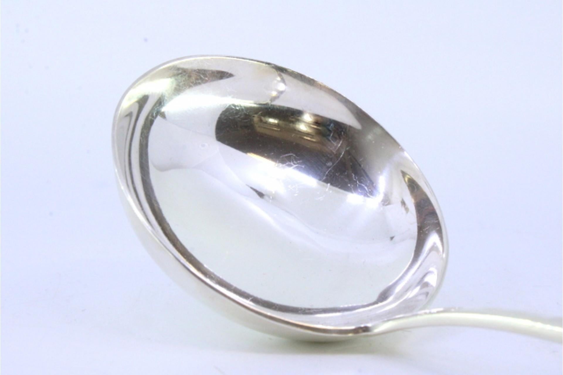 20th Century Smooth silver soup ladle in the caninhas style For Sale