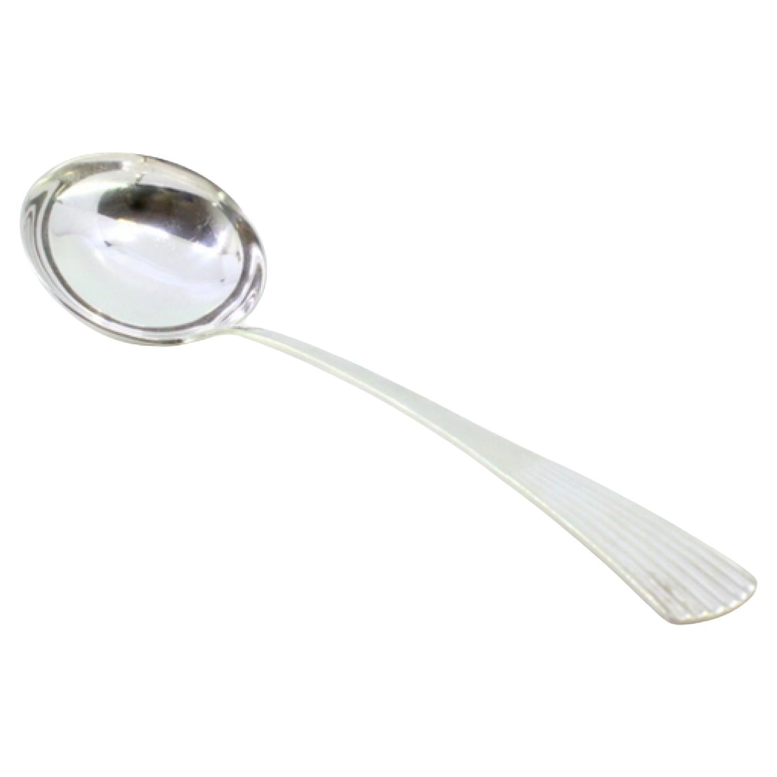 Smooth silver soup ladle in the caninhas style For Sale