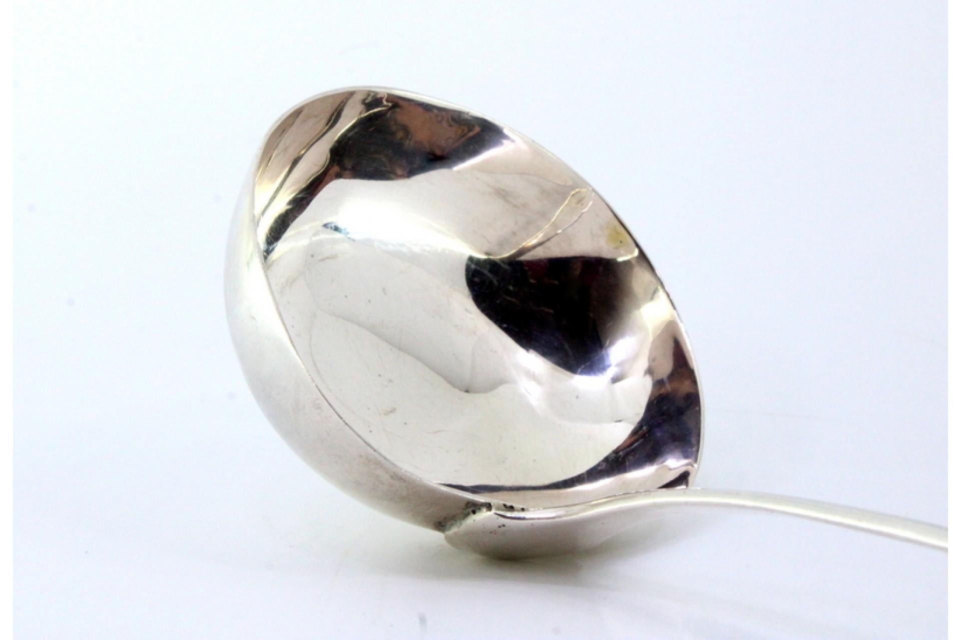 European Smooth silver soup ladle with a reed-style handle For Sale