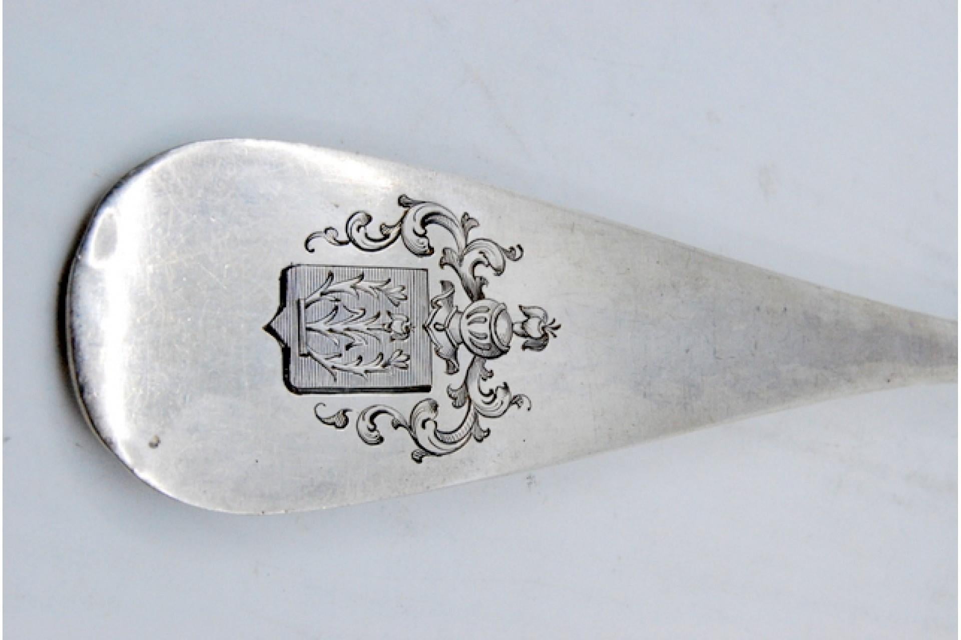 19th Century Smooth silver soup ladle with coat of arms on the handle For Sale