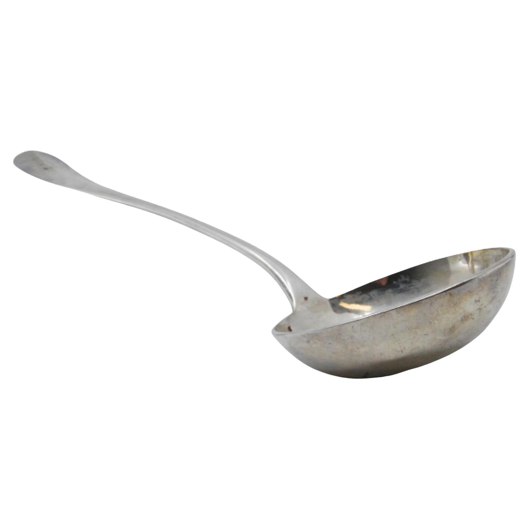 Smooth silver soup ladle with coat of arms on the handle For Sale
