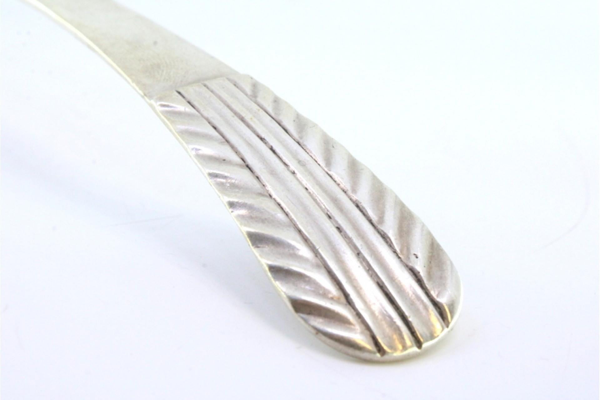 European Smooth silver soup ladle with embossed handle For Sale