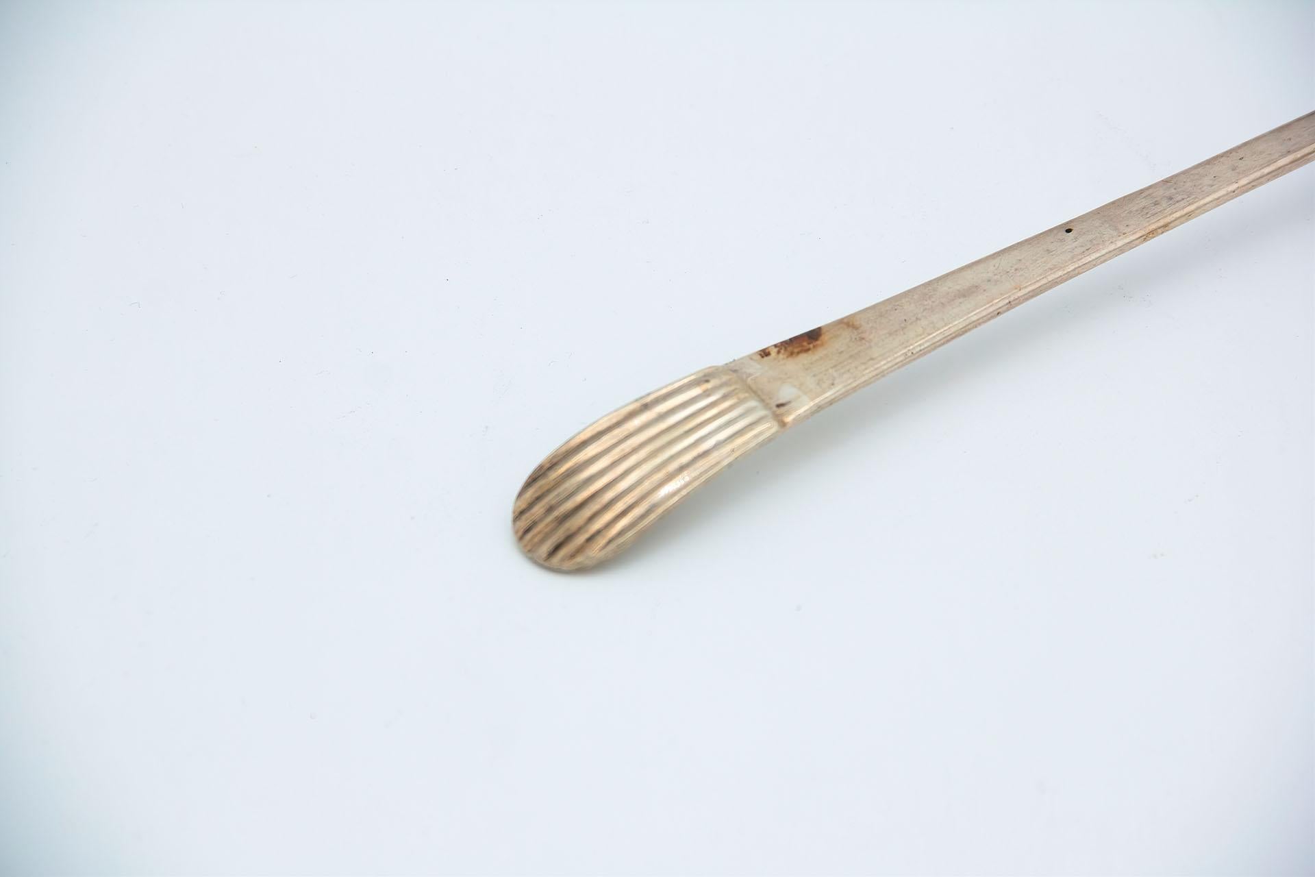 European Smooth silver soup ladle with embossed handle in the reed style For Sale
