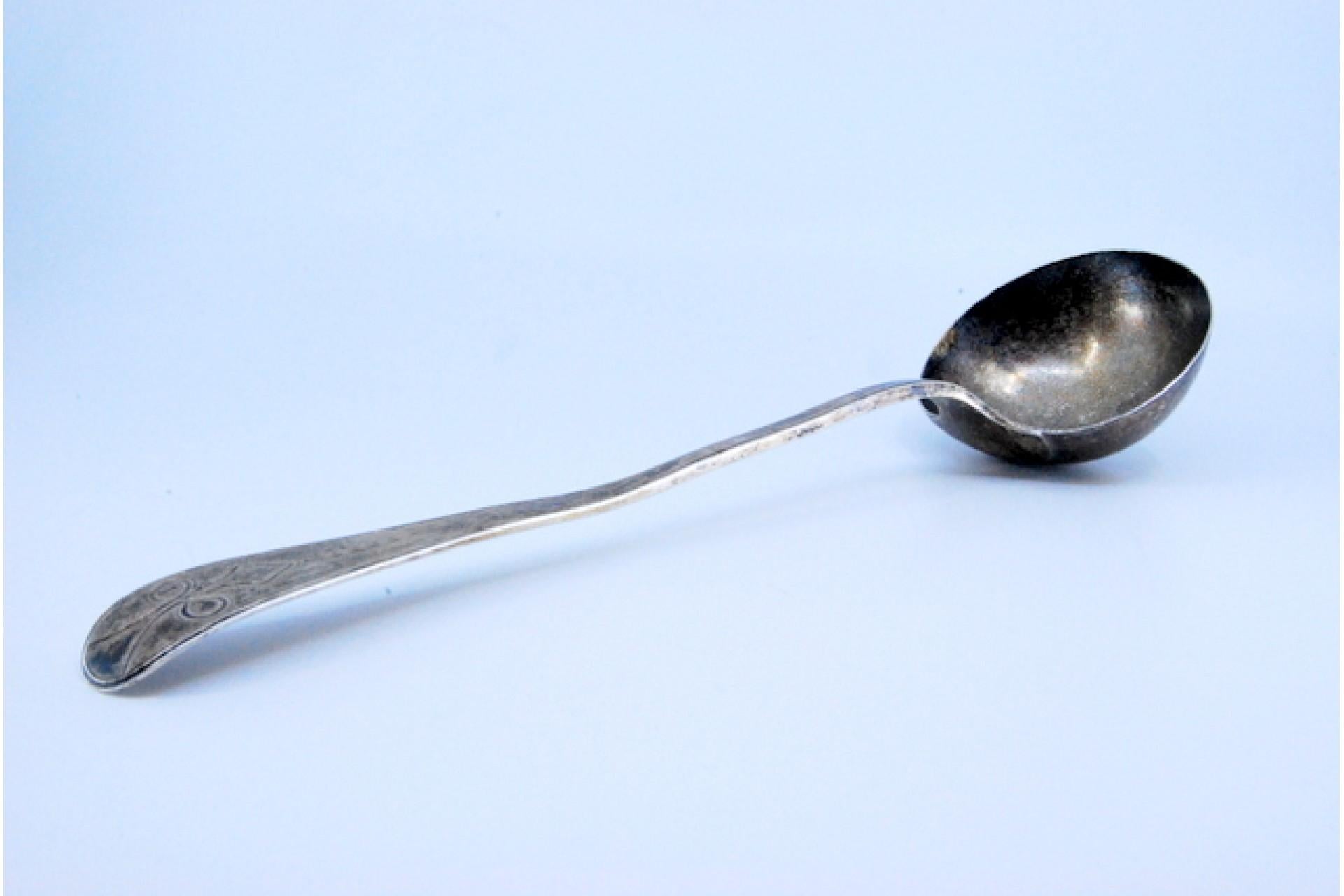 European Smooth silver soup ladle with flower engraved on the handle For Sale