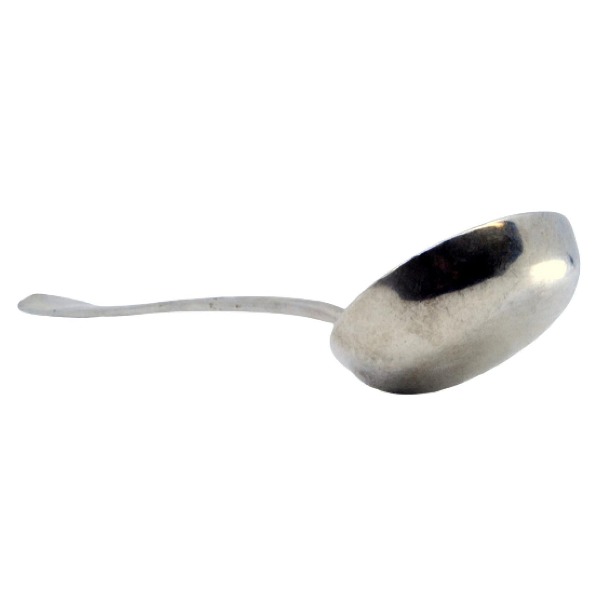 Smooth silver soup ladle with relief on the handle