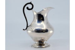 Smooth silver water jug