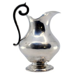 Smooth silver water jug