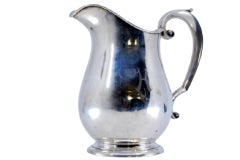 Smooth silver water jug