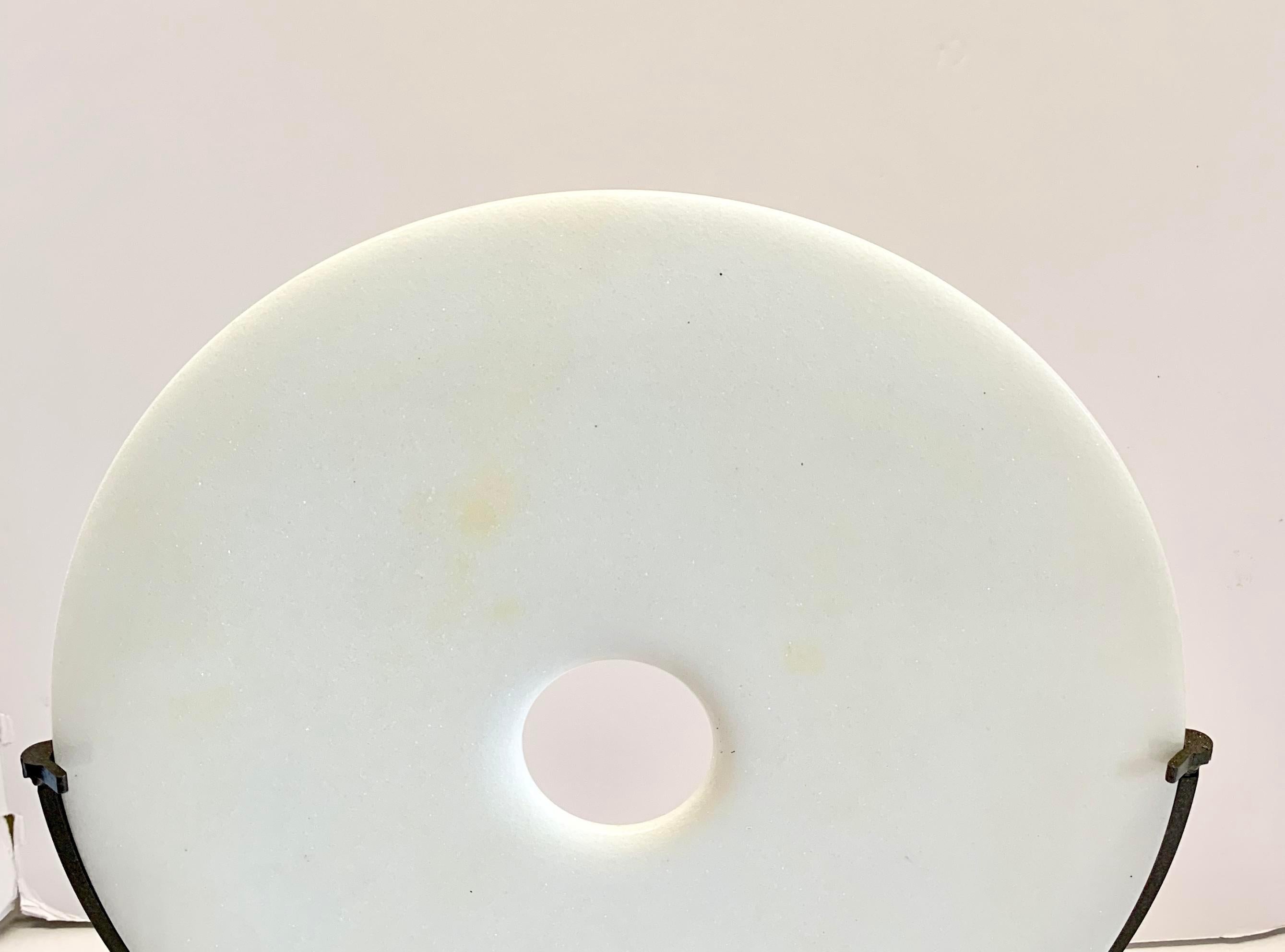 Contemporary Chinese smooth white marble disc on stand
