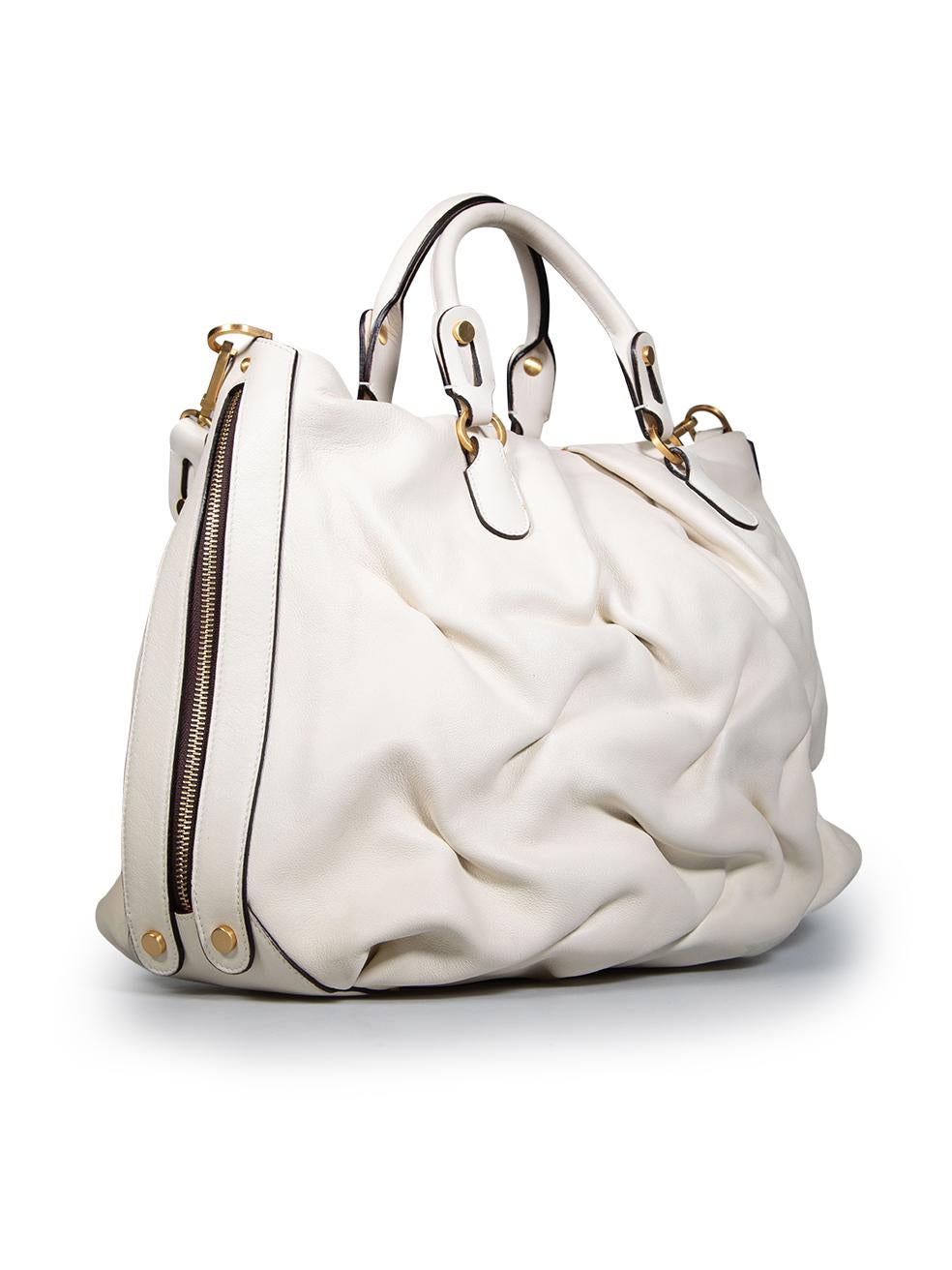 CONDITION is Good. Minor wear to bag is evident. Light signs of wear to the front, back, sides, base and both top handles and internal tabs with discolourations. Small scratches on the the bottom feet. The lining has small abrasion and pull to the