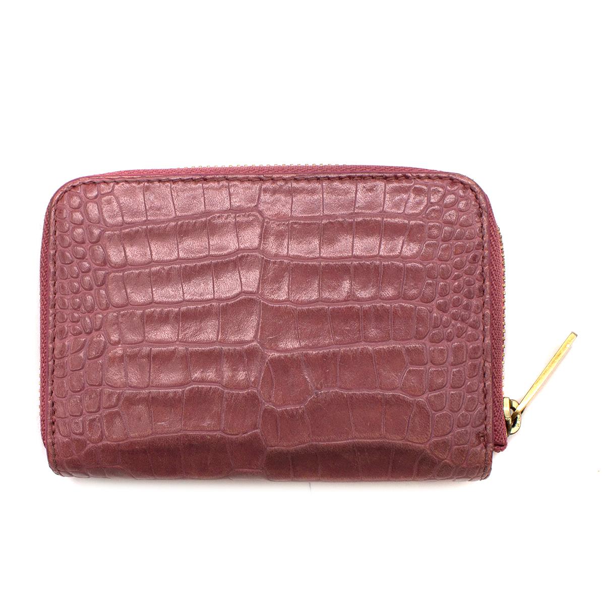 Smythson Pink Alligator Leather Wilde Zip Coin Purse

- Pink, coin purse in exotic alligator skin
- Zip fastening
- Gold-tone hardware
- Soft lambskin interior
- Two card pockets

Please note, these items are pre-owned and may show some signs of