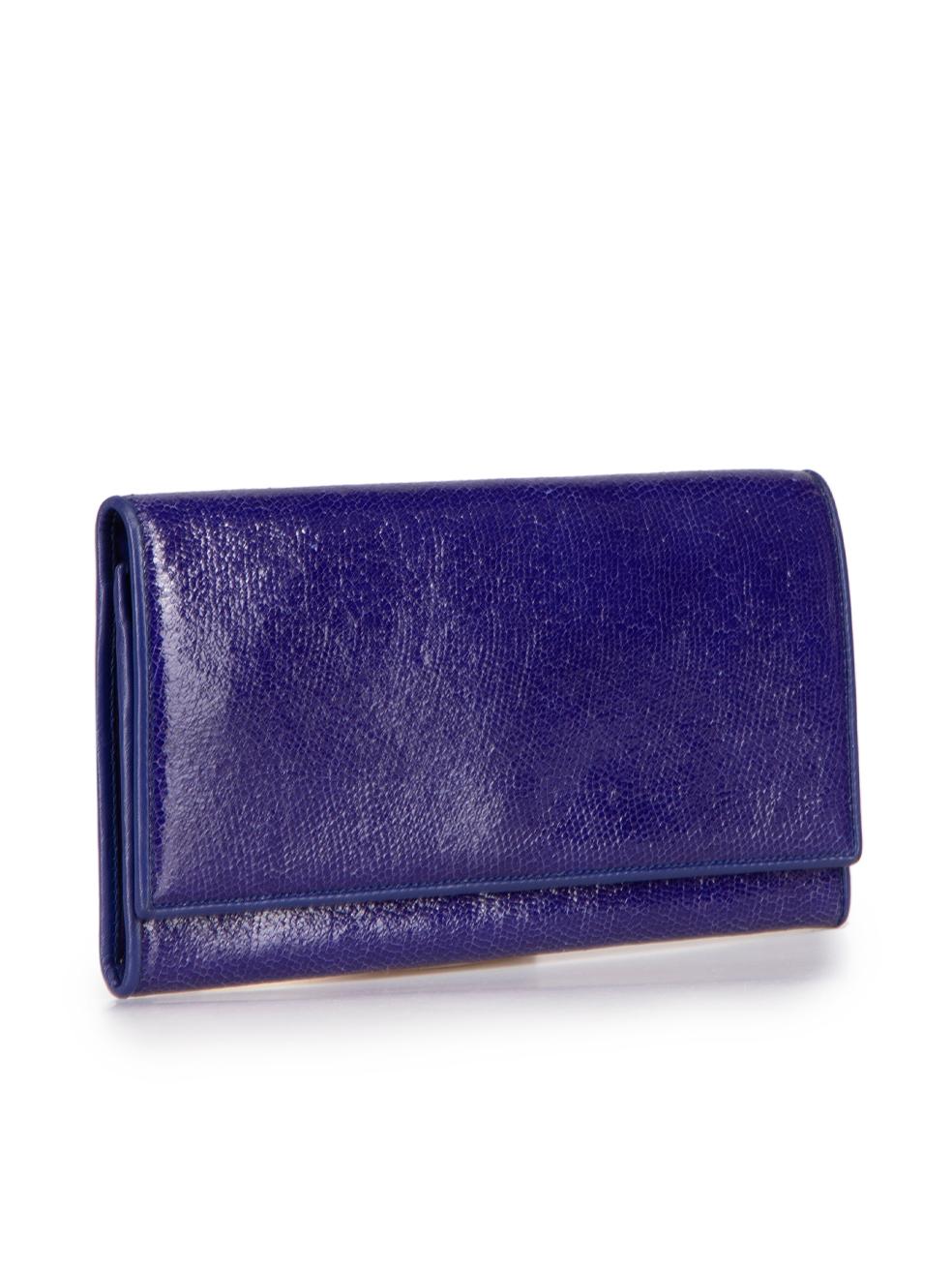 CONDITION is Very good. Minimal wear to wallet is evident. Minimal indents to patent leather on front flap. Indent and abrasion to interior leather on this used Smythson designer resale item.
 
Details
Purple
Patent leather
Travel wallet
Embossed