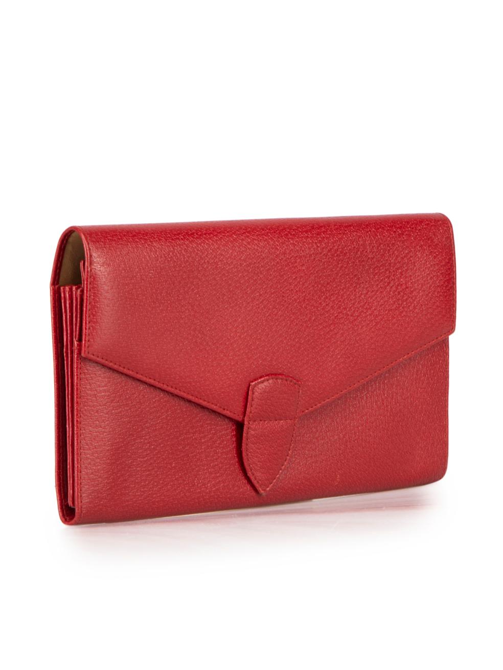 CONDITION is Very good. Minimal wear to wallet is evident. Minimal scratches to leather on front, minimal abrasion to the tip of strap closure. Minor sticker stains on the interior of wallet on this used Smythson designer resale item.
