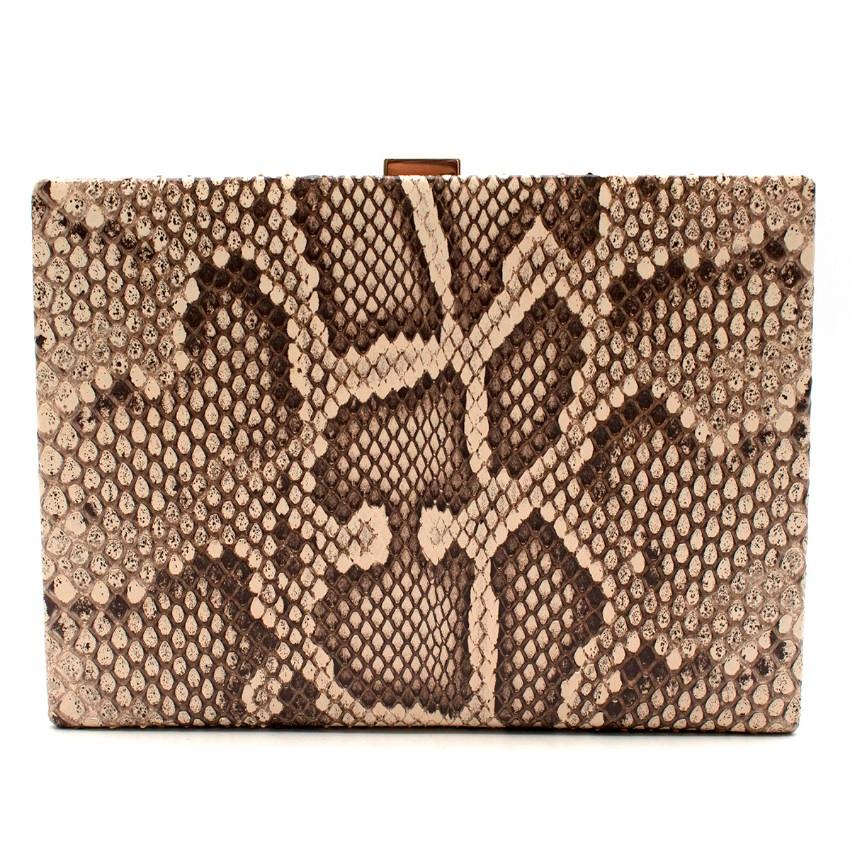 Smythson Soho Python Clutch


- Book style clutch bag
- Natural coloured python 
- Gold-tone hardware
- Clasp closure
- Black leather lining
- Main compartment with three card slots
- Gold foil branding printed on the lining

Please note, these