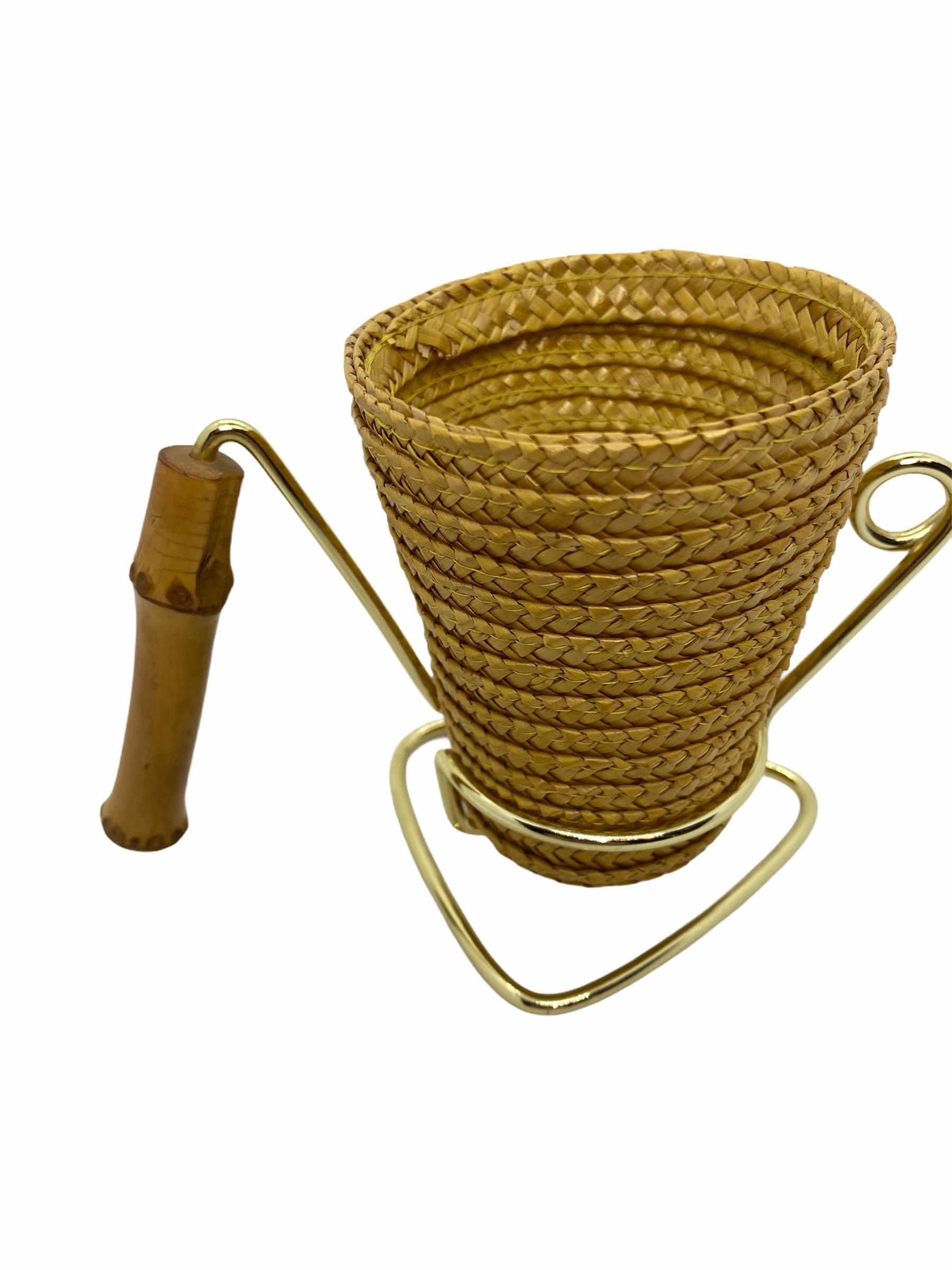 This lovely piece is typical, 1950s. The basket is for salt sticks or nuts and the golden metal stand is for pretzels.
The handle is made of bamboo. The metal holder is in gold.
The set is in very good condition. There are no damages. A nice