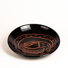 Plat en serpent piqué à sa propre queue par Charles Burnex, 2024