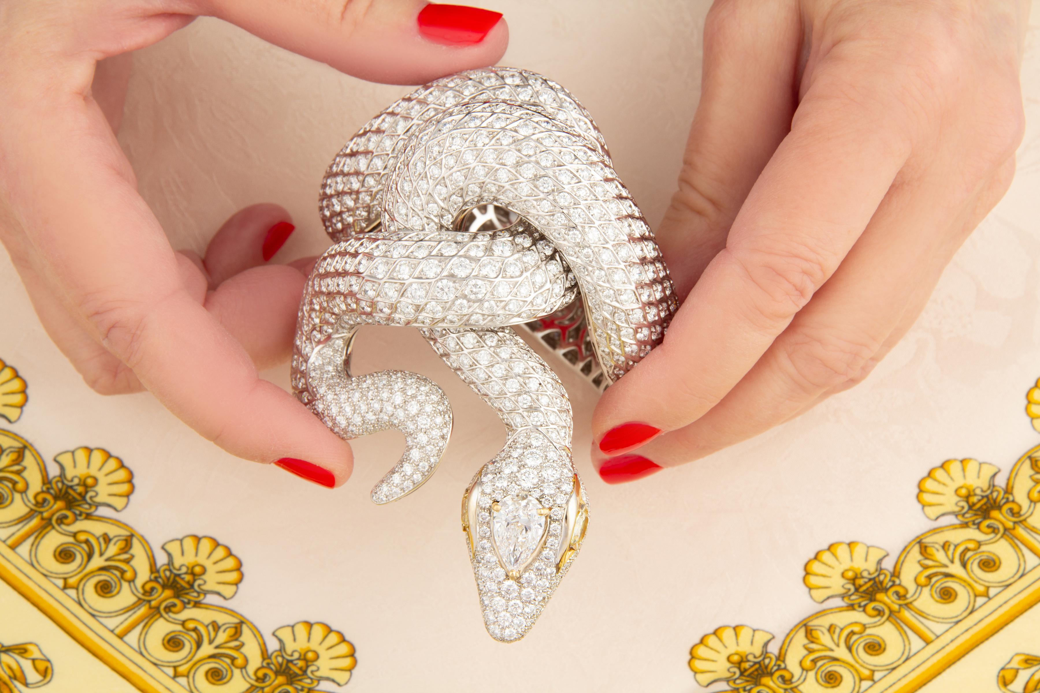 The snake cuff bracelet with diamonds was sculpted from a single piece of 18 carat white gold, resulting in an unbroken, continuous flow from head to tail. This extremely rare and extraordinary feat of hand workmanship captures the snake’s essence