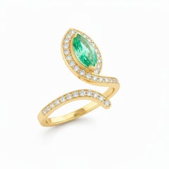 Snake design 14k gold engagement Emerald ring