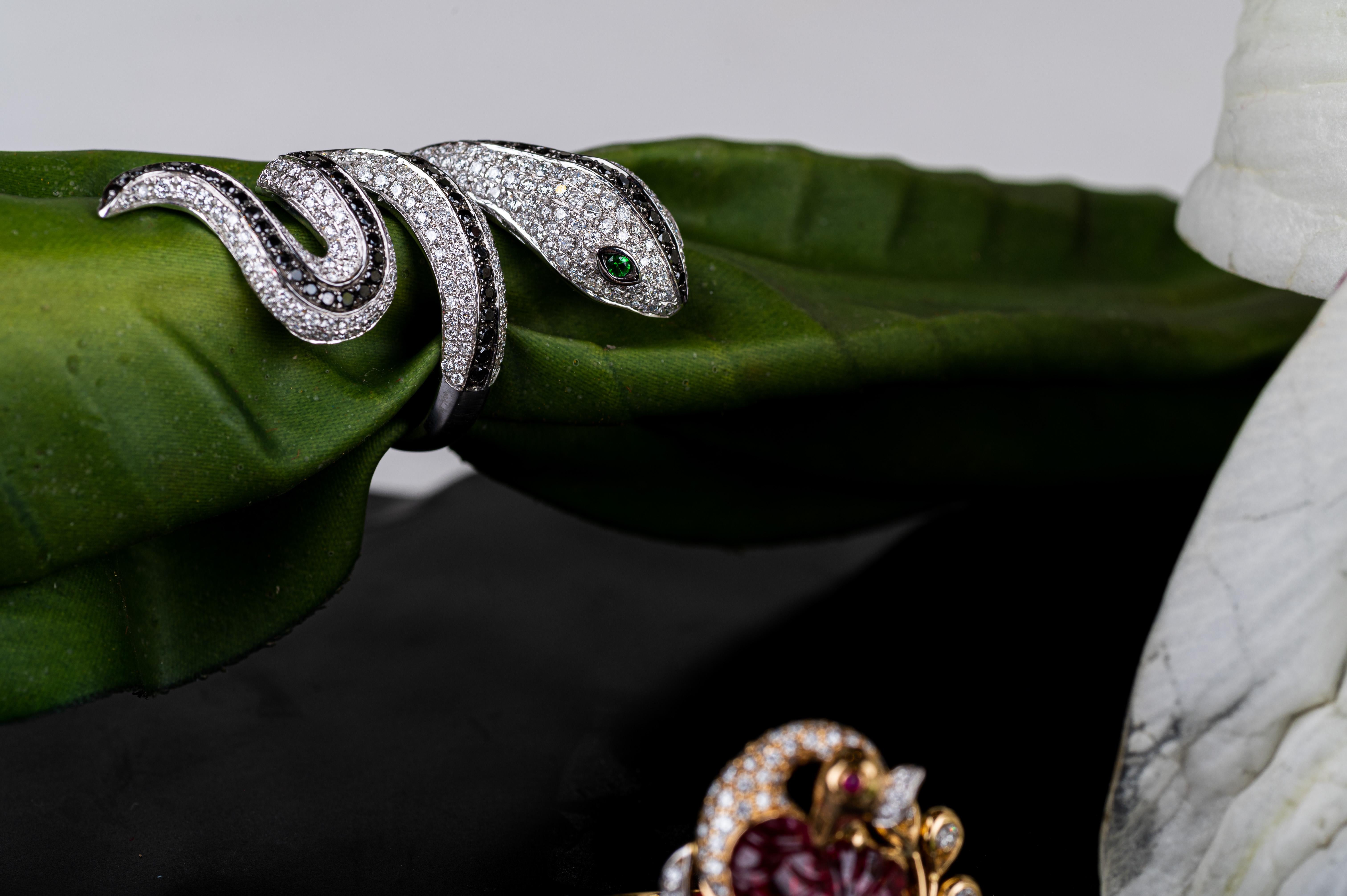 For Sale:  Tsavorite Eye and Diamond Snake Coil Ring in 18k Solid White Gold 7