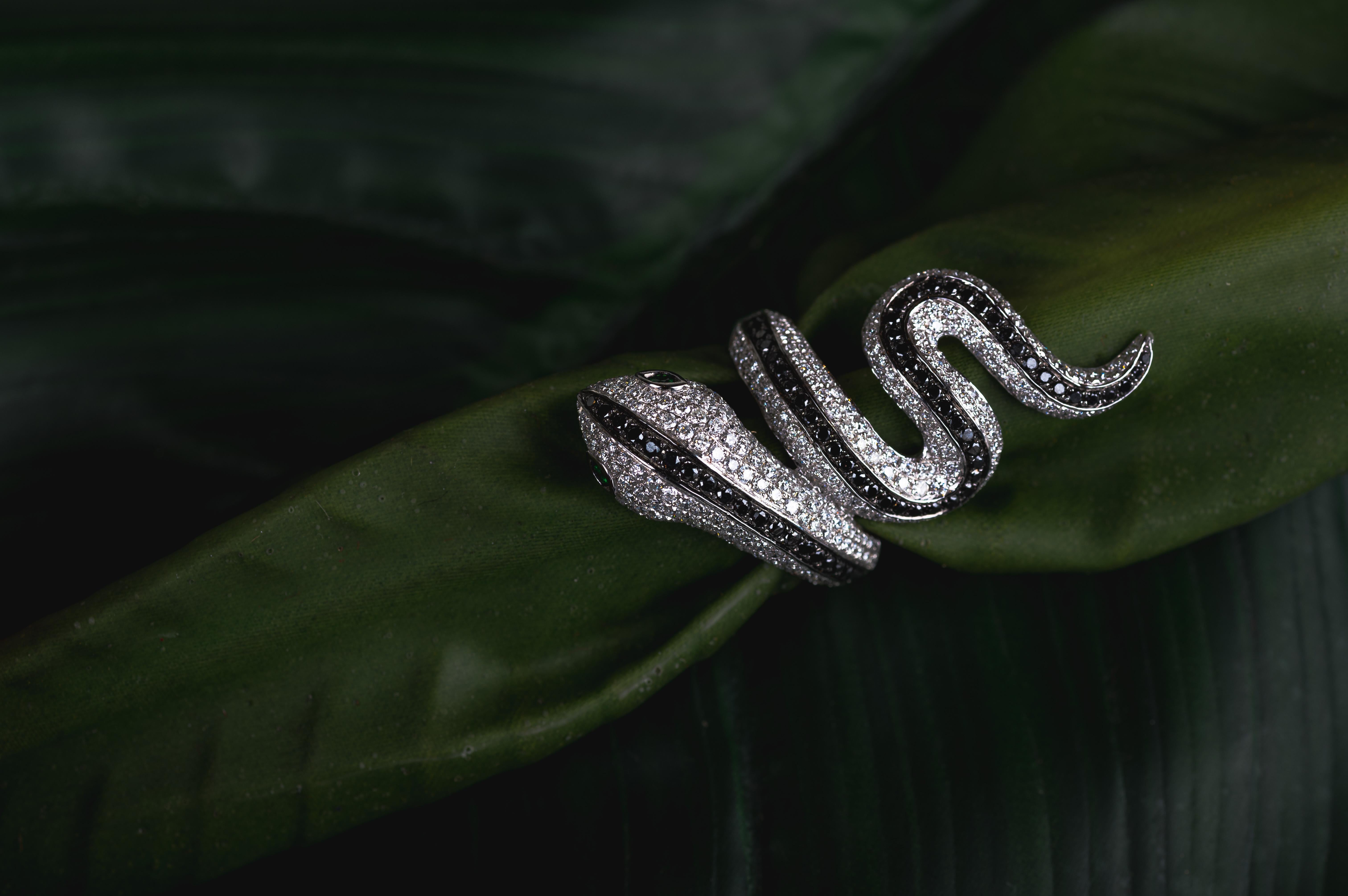 For Sale:  Tsavorite Eye and Diamond Snake Coil Ring in 18k Solid White Gold 5