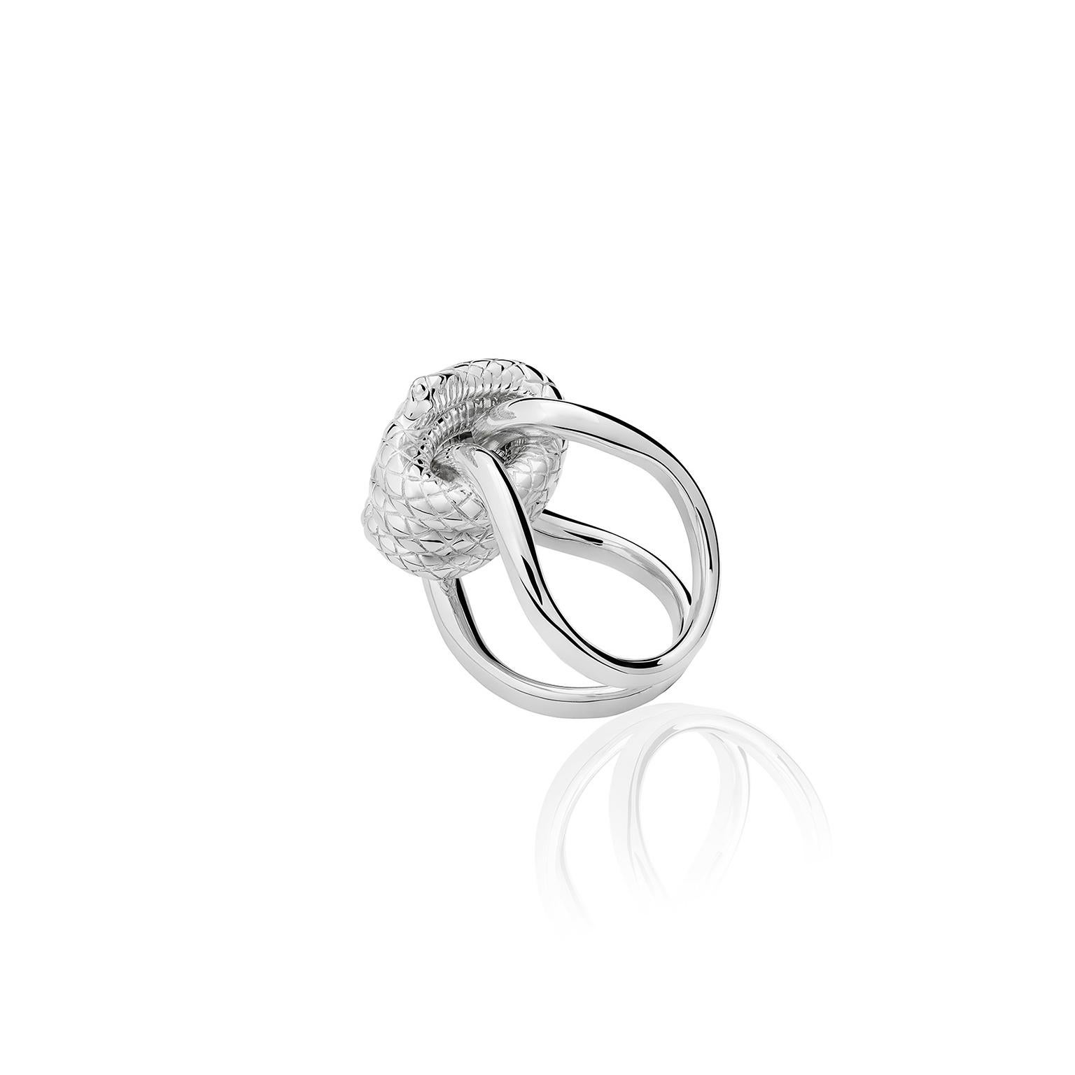 The Knotted Snake Ring from the Animal´s Collection by TANE is made of .925 Silver, it´s double polished silver body is joined at the top by a perfectly sculpted snake that is entangled in an elegant knot.  Handmade in Mexico.

To preserve the