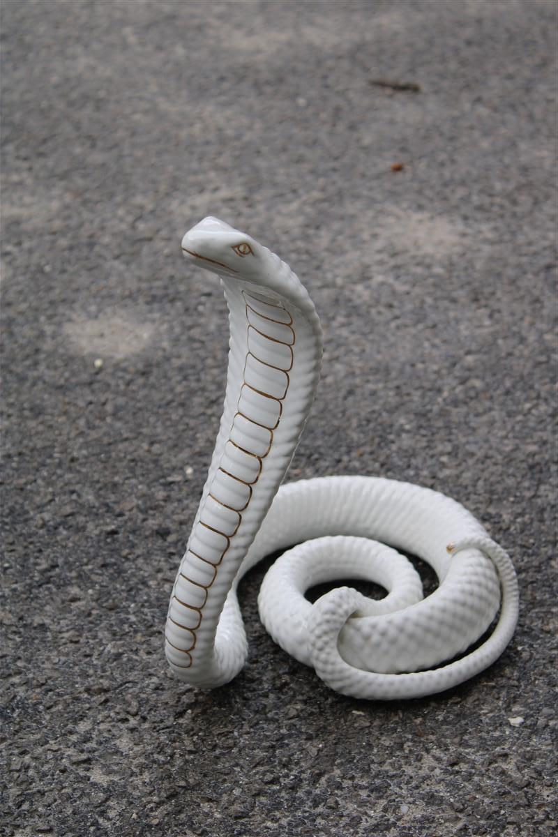 Snake ornamental sculpture In white and gold ceramic Tommaso barbi 1970s.