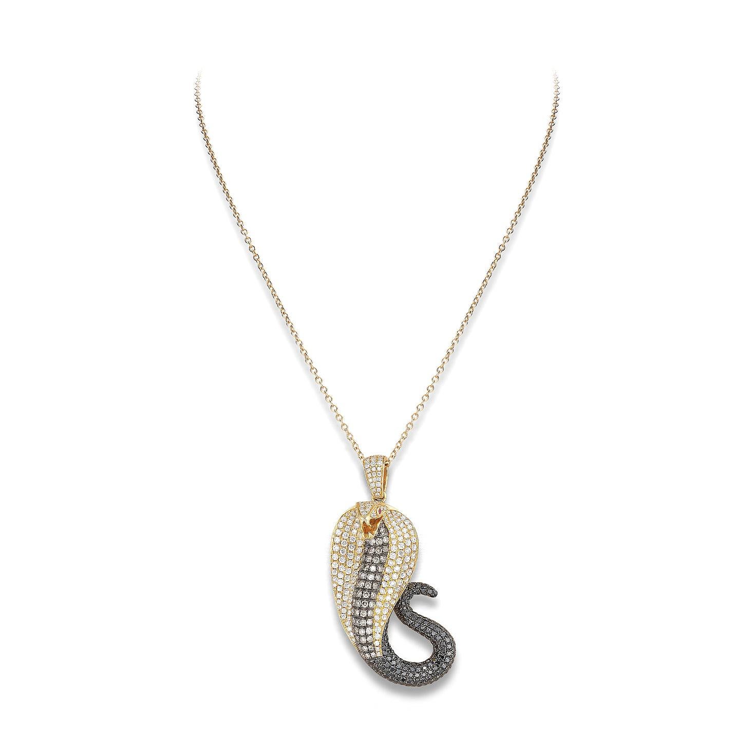 Snake pendant in 18kt yellow gold set with white brown and black diamonds 3.69 and 2 rubies 0.02 cts           