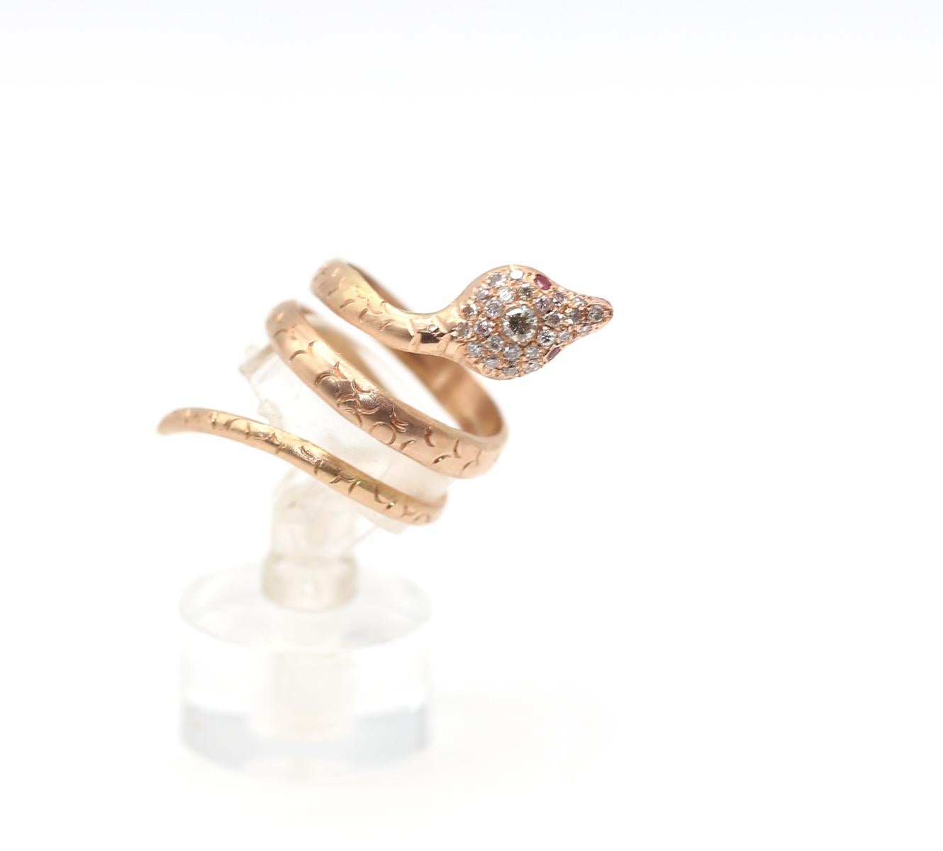 2025 is the Snake year according to a Lunar Horoscope. This fine ring was created in 1950, a time when European designers were trying to bring color and beauty back into life after the WW2 ended. 
Immaculately crafted with fine detailing. Set with