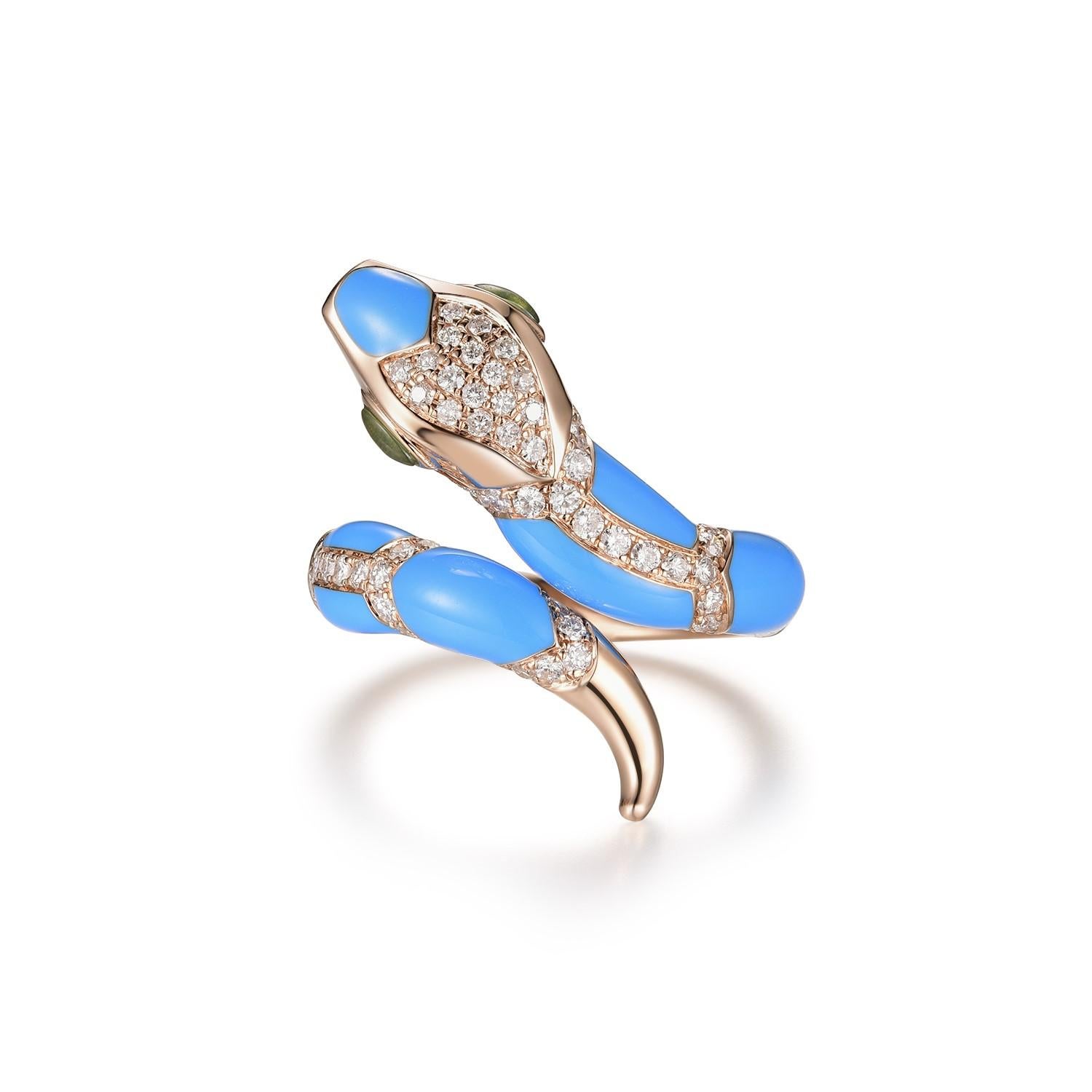 This stunning snake ring features 0.50 carat of white round diamonds, the body is covered with blue enamel. The eyes of the ring is set with garnet (eye). The snake can be customized in any color or stones. Feel free to contact me for inquiry. More