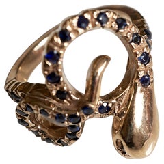 Bague cocktail en forme de serpent en or vermeil, ornée d'un diamant noir et d'un diamant blanc J Dauphin