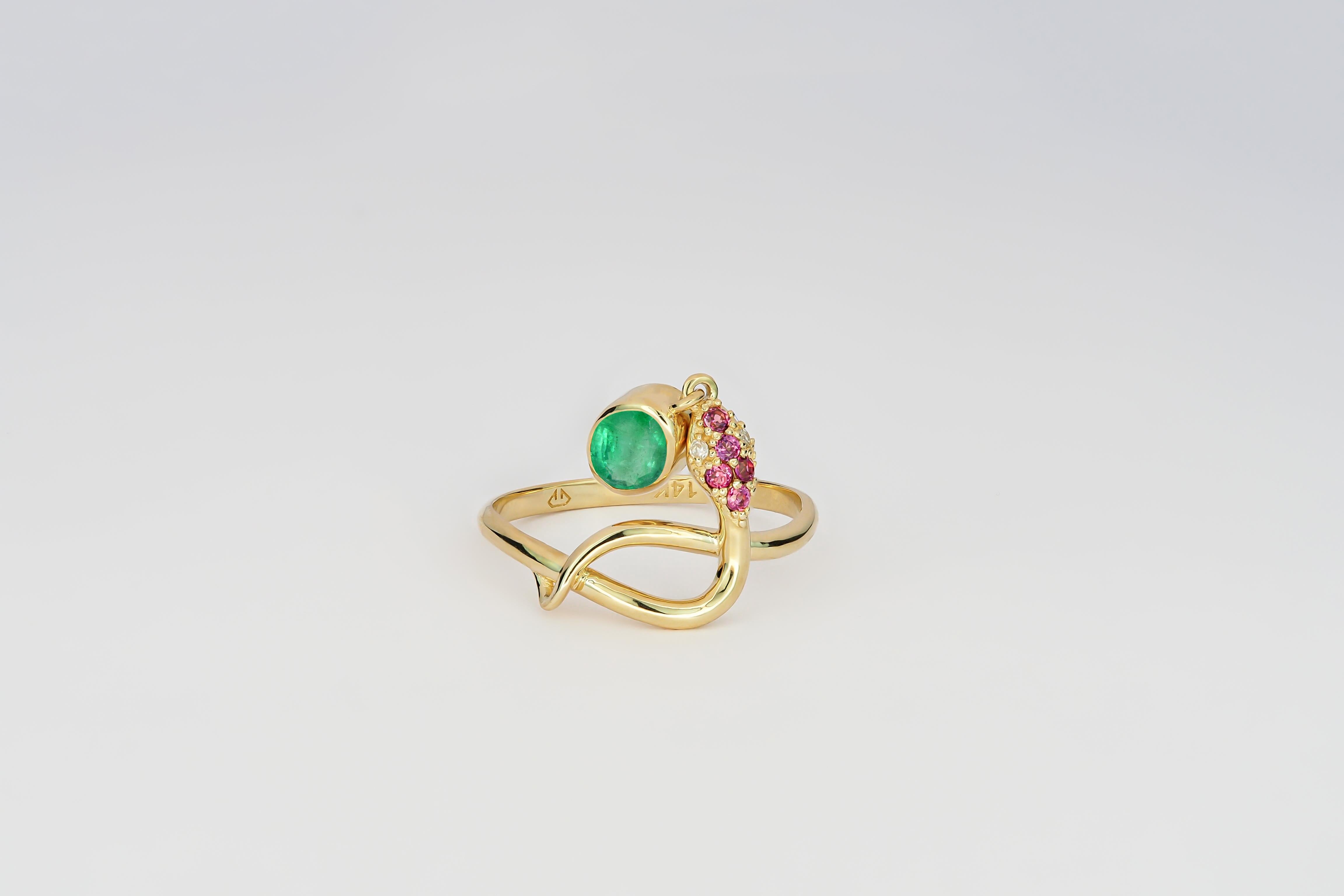 Snake ring with Emerald. Emerald gold ring. Snake gold ring. Genuine Emerald ring. Oval Emerald ring. May birthstone ring. Emerald vintage ring. 
14k yellow gold ring with blue Emerald, rose sapphires and diamonds. 

Metal: 14k gold.
Weight: 2.25 g.