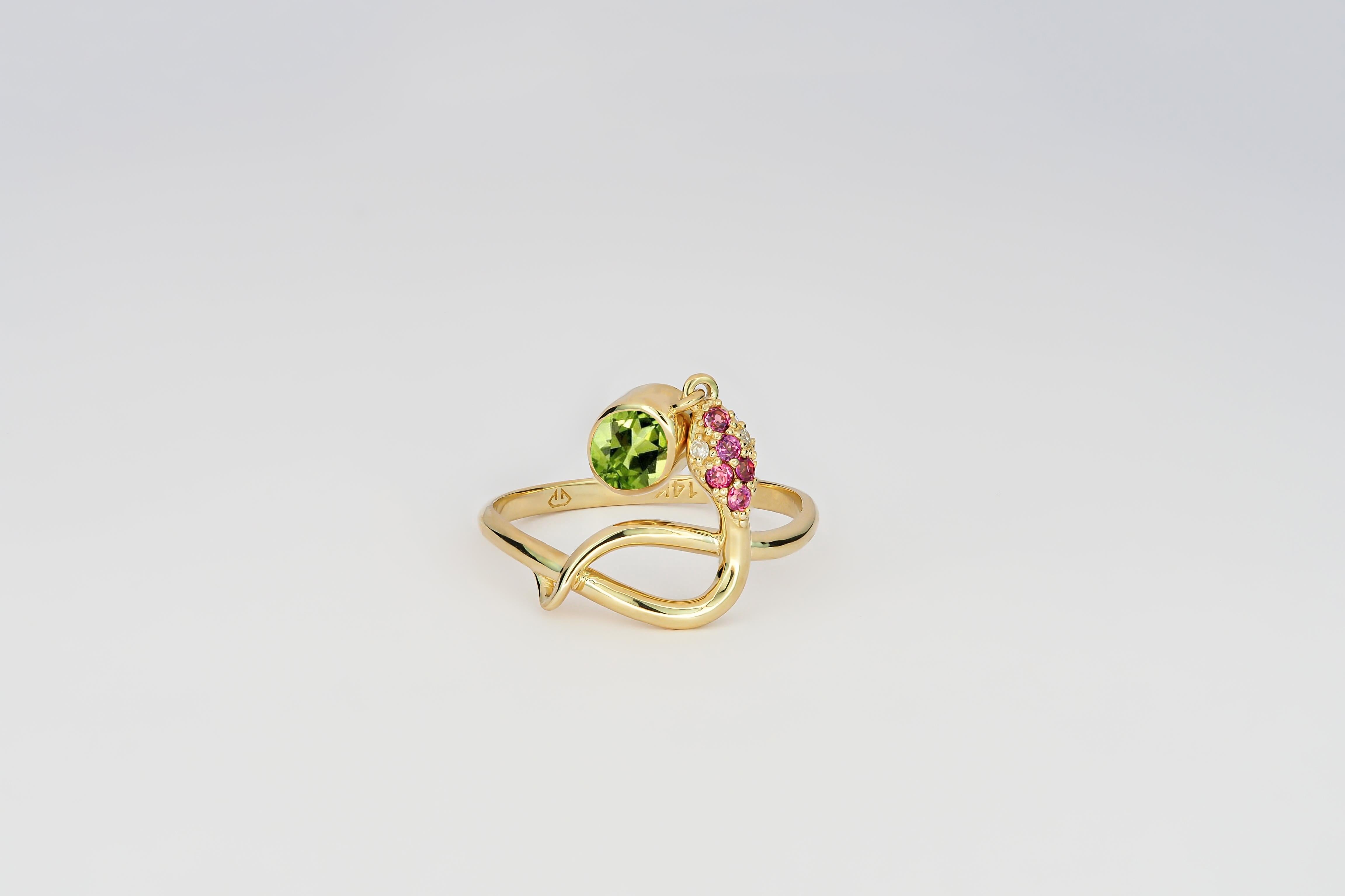 Snake ring with Peridot. Peridot gold ring. Snake gold ring. Genuine Peridot ring. Oval Peridot ring. October birthstone ring. Peridot vintage ring. 
14k yellow gold ring with blue Peridot, rose sapphires and diamonds. 

Metal: 14k gold.
Weight: