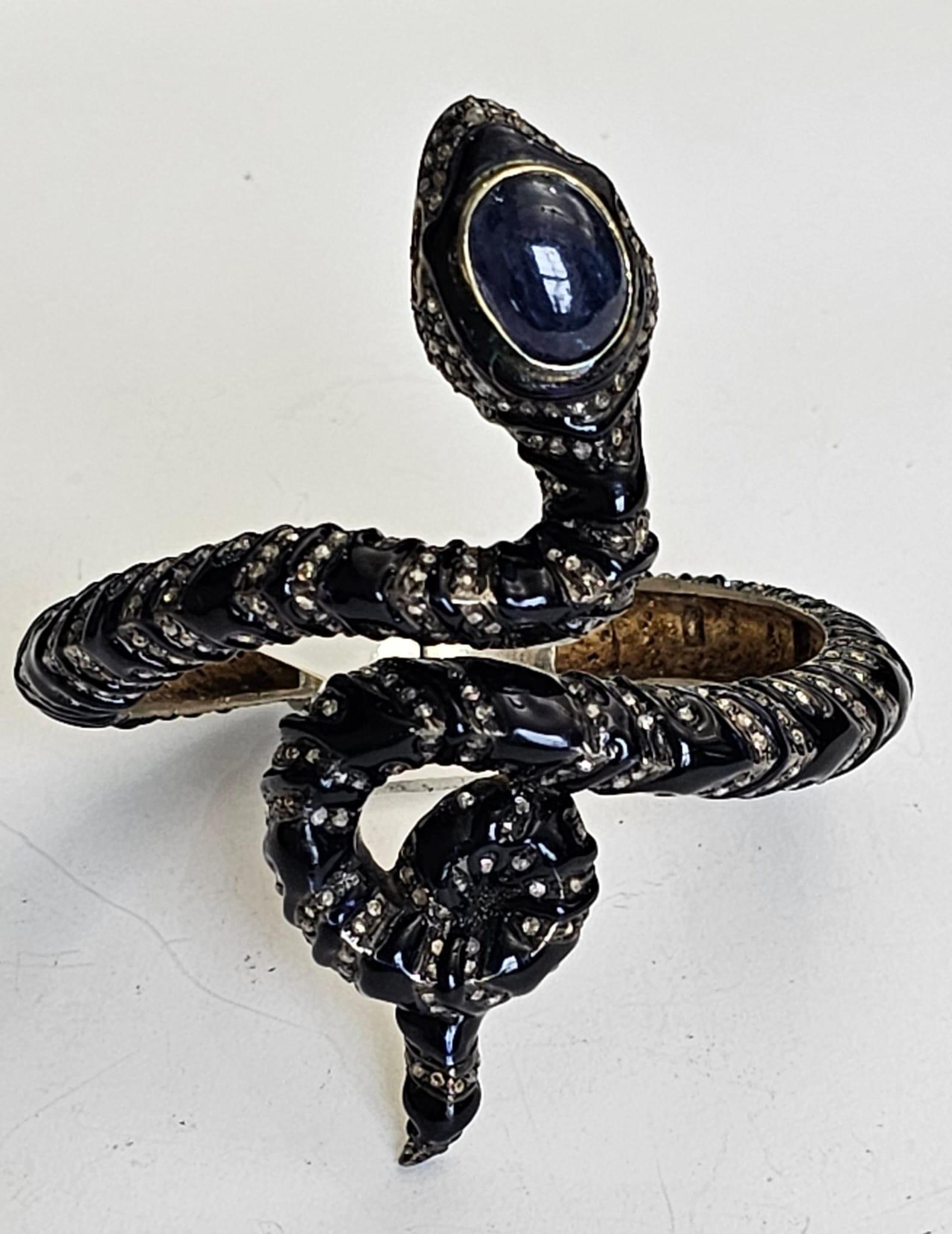 Mixed Cut Snake Shaped Blue Sapphire Bangle Accented With Pave Diamonds For Sale